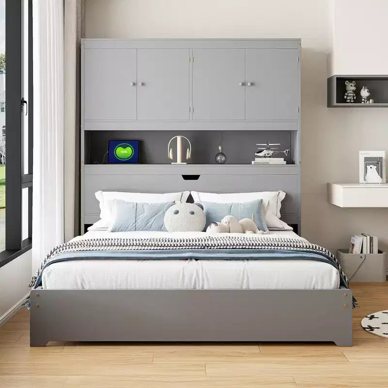 Struttura letto matrimoniale con cassetti contenitore e porte USB nella testiera